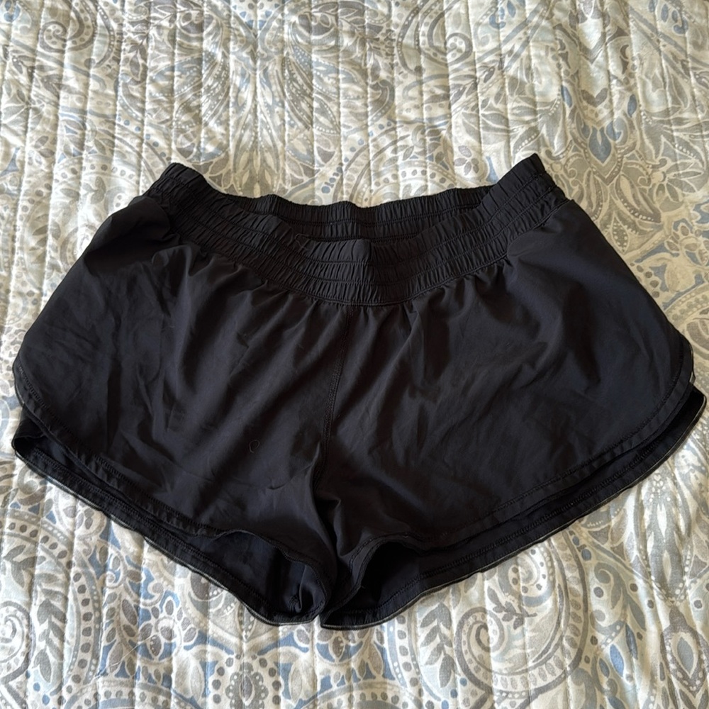 GUC - lululemon black shorts with split side leg